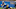 UCLA Bruins linebacker Matthew Muasau (57) and defensive backs Osiris Gilbert (18) 