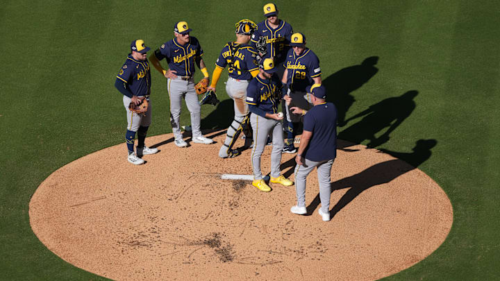 Oct 16, 2025; Los Angeles, California, USA; Milwaukee Brewers pitcher Aaron Ashby (26) is removed by manager Pat Murphy in the first inning against the Los Angeles Dodgers during game three of the NLCS round for the 2025 MLB playoffs at Dodger Stadium. Mandatory Credit: Kirby Lee-Imagn Images