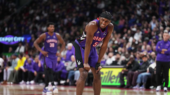 Oct 23, 2024; Toronto, Ontario, CAN; Toronto Raptors guard Immanuel Quickley (5) reacts after falling against the Cleveland Cavaliers during the second quarter at Scotiabank Arena. Mandatory Credit: Nick Turchiaro-Imagn Images
