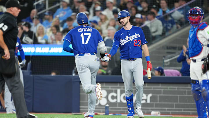 Apr 6, 2026; Toronto, Ontario, CAN; Los Angeles Dodgers designated hitter Shohei Ohtani (17) hits a home run and celebrates with right fielder Kyle Tucker (23) against the Toronto Blue Jays during the sixth inning at Rogers Centre. Mandatory Credit: Nick Turchiaro-Imagn Images