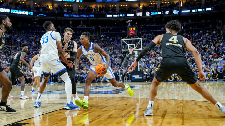 Mar 21, 2024; Pittsburgh, PA, USA; Kentucky Wildcats guard Rob Dillingham (0) pushes towards the net during the second half in the first round of the 2024 NCAA Tournament at PPG Paints Arena. Mandatory Credit: Gregory Fisher-USA TODAY Sports