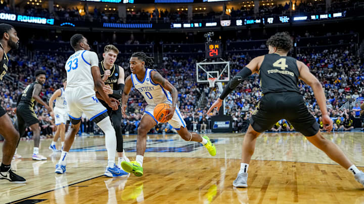 Mar 21, 2024; Pittsburgh, PA, USA; Kentucky Wildcats guard Rob Dillingham (0) pushes towards the net