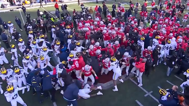 A huge fight broke out between Michigan and Ohio State players after the Wolverines upset the Buckeyes.