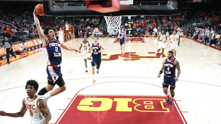 Feb 18, 2026; Los Angeles, California, USA; Illinois Fighting Illini guard Andrej Stojakovic (2) dunks the ball against Southern California Trojans guard Jerry Easter II (8) in the second half at Galen Center. Mandatory Credit: Kirby Lee-Imagn Images