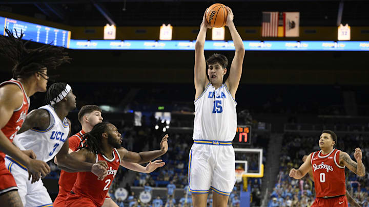 Feb 23, 2025; Los Angeles, California, USA; UCLA Bruins center Aday Mara (15) clears a rebound during the second half agains th eOhio State Buckeyes at Pauley Pavilion presented by Wescom. Mandatory Credit: Robert Hanashiro-Imagn Images Feb 23, 2025; Los Angeles, California, USA; UCLA Bruins center Aday Mara (15) clears a rebound during the second half agains th eOhio State Buckeyes at Pauley Pavilion presented by Wescom. Mandatory Credit: Robert Hanashiro-Imagn Images