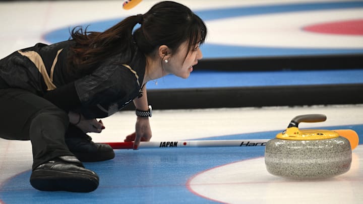 Yoshida Chinami of Japan competes during the curling women's gold medal game of Beijing 2022 Winter Olympics