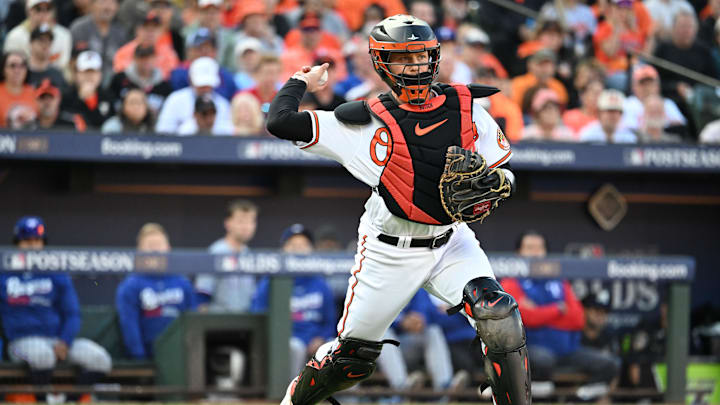 Oct 7, 2023; Baltimore, Maryland, USA; Baltimore Orioles catcher Adley Rutschman (35) throws to first base during game one of the ALDS against the Texas Rangers