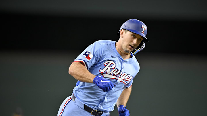 Sep 21, 2025; Arlington, Texas, USA; Texas Rangers left fielder Wyatt Langford (36) rounds the bases after he hits a home run against the Miami Marlins during the sixth inning at Globe Life Field. Mandatory Credit: Jerome Miron-Imagn Images