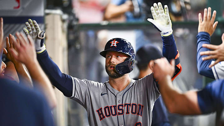 Sep 27, 2025; Anaheim, California, USA; Houston Astros first baseman Christian Walker (8) celebrates with teammates after hitting a solo home run against the Los Angeles Angels during the ninth inning at Angel Stadium. Mandatory Credit: Jonathan Hui-Imagn Images Sep 27, 2025; Anaheim, California, USA; Houston Astros first baseman Christian Walker (8) celebrates with teammates after hitting a solo home run against the Los Angeles Angels during the ninth inning at Angel Stadium. Mandatory Credit: Jonathan Hui-Imagn Images