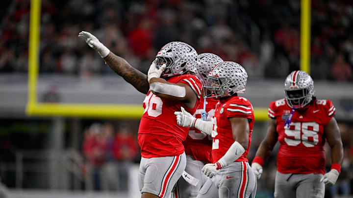 Dec 31, 2025; Arlington, TX, USA; Ohio State Buckeyes defensive end Eddrick Houston (96) celebrates during the 2025 Cotton Bowl and quarterfinal game of the College Football Playoff at AT&T Stadium. Mandatory Credit: Jerome Miron-Imagn Images Dec 31, 2025; Arlington, TX, USA; Ohio State Buckeyes defensive end Eddrick Houston (96) celebrates during the 2025 Cotton Bowl and quarterfinal game of the College Football Playoff at AT&T Stadium. Mandatory Credit: Jerome Miron-Imagn Images