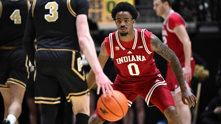 Feb 20, 2026; West Lafayette, Indiana, USA;  Indiana Hoosiers guard Jasai Miles (0) defends Purdue Boilermakers guard Braden Smith (3) during the first half at Mackey Arena. Mandatory Credit: Marc Lebryk-Imagn Images