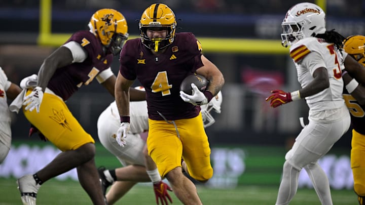 Dec 7, 2024; Arlington, TX, USA; Arizona State Sun Devils running back Cam Skattebo (4) in action during the game between the Iowa State Cyclones and the Arizona State Sun Devils at AT&T Stadium. Mandatory Credit: Jerome Miron-Imagn Images