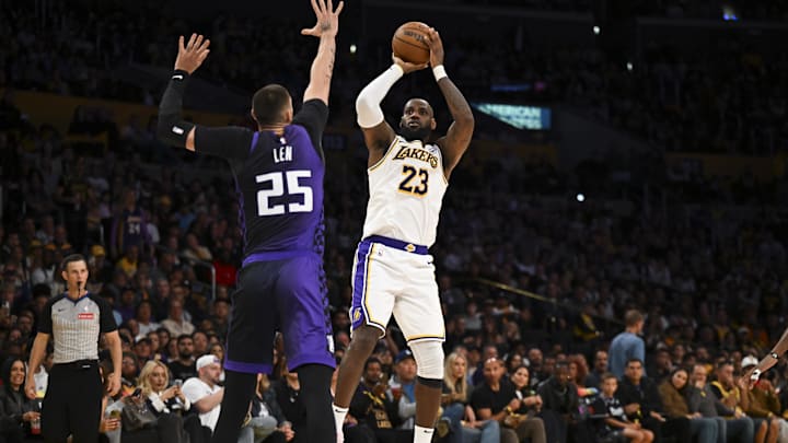 Oct 26, 2024; Los Angeles, California, USA; Los Angeles Lakers forward LeBron James (23) shoots against Sacramento Kings center Alex Len (25) during the second half at Crypto.com Arena. Mandatory Credit: Jonathan Hui-Imagn Images