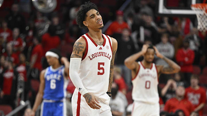 Dec 8, 2024; Louisville, Kentucky, USA;  Louisville Cardinals guard Terrence Edwards Jr. (5) reacts after committing a foul against the Duke Blue Devils during the second half at KFC Yum! Center. Duke defeated Louisville 76-65. Mandatory Credit: Jamie Rhodes-Imagn Images