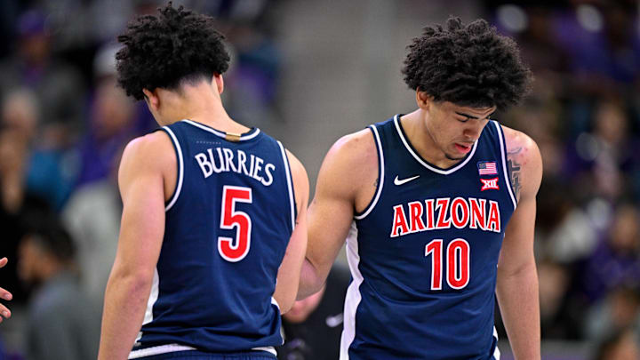 Jan 10, 2026; Fort Worth, Texas, USA; Arizona Wildcats guard Brayden Burries (5) and forward Koa Peat (10) look on before the game between the Horned Frogs and the Wildcats at Ed and Rae Schollmaier Arena. Mandatory Credit: Jerome Miron-Imagn Images