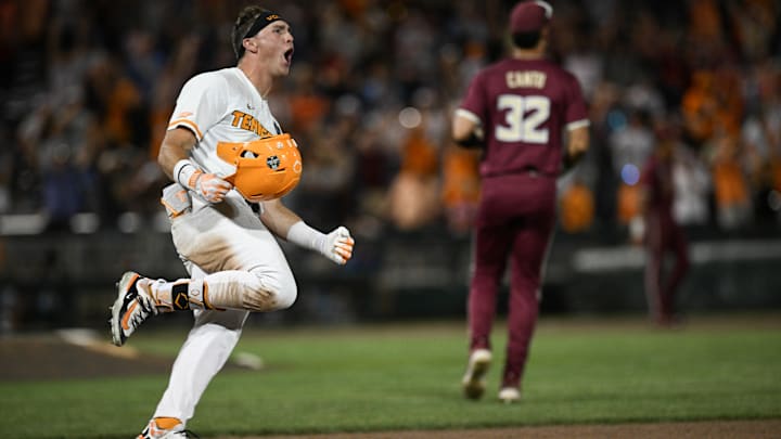 Jun 14, 2024; Omaha, NE, USA;  Tennessee Volunteers left fielder Dylan Dreiling (8) singles in the winning run against the Florida State Seminoles during the ninth inning at Charles Schwab Filed Omaha. Mandatory Credit: Steven Branscombe-USA TODAY Sports