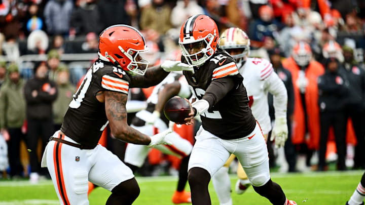 Cleveland Browns quarterback Shedeur Sanders (12) hands off the ball to Cleveland Browns running back Quinshon Judkins. Mandatory Credit: Ken Blaze-Imagn Images Cleveland Browns quarterback Shedeur Sanders (12) hands off the ball to Cleveland Browns running back Quinshon Judkins. Mandatory Credit: Ken Blaze-Imagn Images