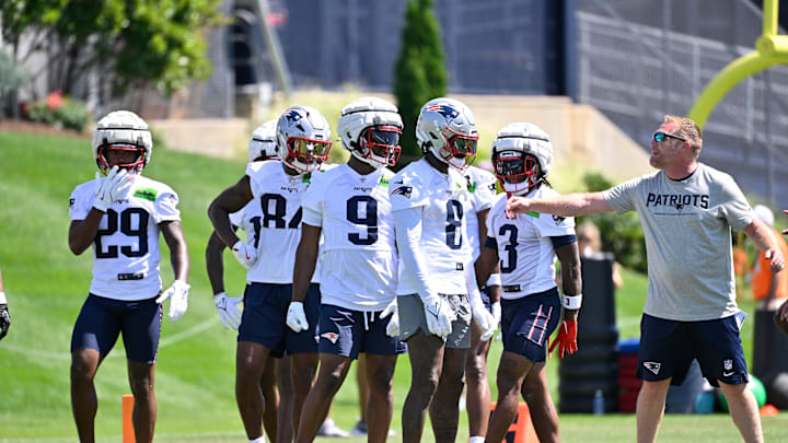 Jul 23, 2025; Foxborough, MA, USA; New England Patriots wide receiver Jeremiah Webb (29), wide receiver Kendrick Bourne (84), wide receiver Kayshon Boutte (9), wide receiver Stefon Diggs (8) and wide receiver DeMario Douglas (3) work with the coaching staff to do a drill during training camp at Gillette Stadium. Mandatory Credit: Eric Canha-Imagn Images