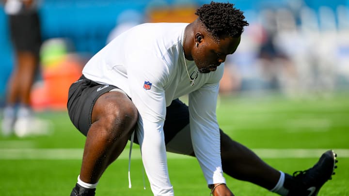 Oct 13, 2024; Nashville, Tennessee, USA;  Indianapolis Colts defensive end Dayo Odeyingbo (54) stretches during pregame warmups against the Tennessee Titans at Nissan Stadium.