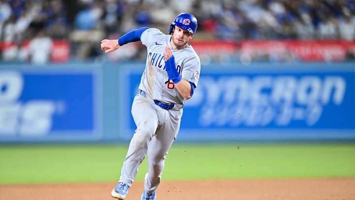 Apr 24, 2026; Los Angeles, California, USA;  Chicago Cubs left fielder Ian Happ (8) rounds the bases during the eighth inning against the Los Angeles Dodgers at Dodger Stadium. Mandatory Credit: William Liang-Imagn Images