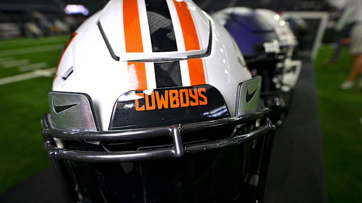 Jul 13, 2023; Arlington, TX, USA; A view of the Oklahoma State Cowboys helmet and logo during the Big 12 football media day at AT&T Stadium. Mandatory Credit: Jerome Miron-Imagn Images