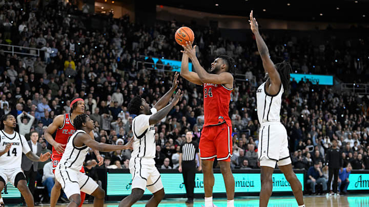 Dec 20, 2024; Providence, Rhode Island, USA; St. John's basketball forward Zuby Ejiofor (24) scores in the final seconds of the second half to beat the Providence Friars at Amica Mutual Pavilion. 