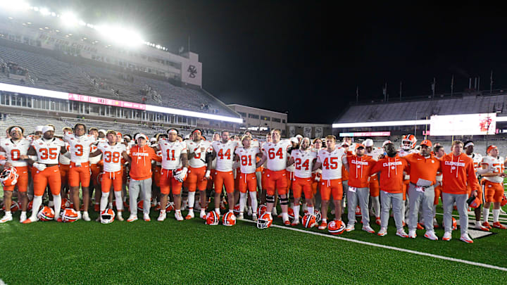 Oct 11, 2025; Chestnut Hill, Massachusetts, USA; The Clemson Tigers salute fans after defeating the Boston College Eagles at Alumni Stadium. Mandatory Credit: Eric Canha-Imagn Images