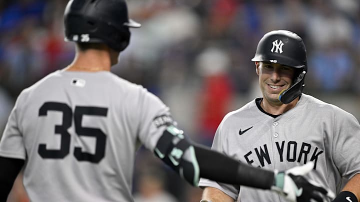Aug 4, 2025; Arlington, Texas, USA; New York Yankees first baseman Paul Goldschmidt (48) celebrates with center fielder Cody Bellinger (35) after Goldschmidt hits a leadoff home run against the Texas Rangers during the first inning at Globe Life Field. Mandatory Credit: Jerome Miron-Imagn Images