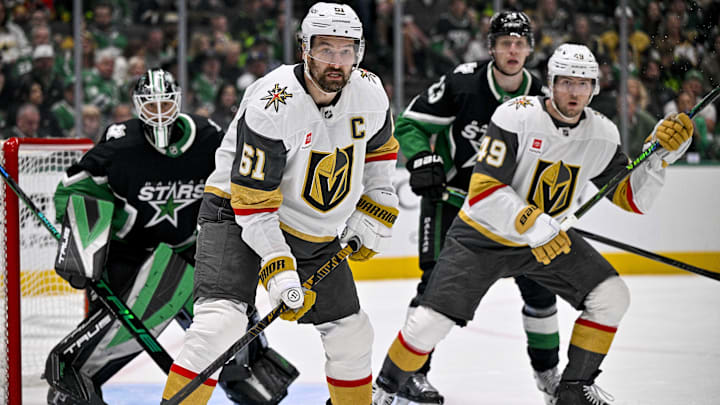 Mar 22, 2026; Dallas, Texas, USA; Vegas Golden Knights right wing Mark Stone (61) looks for the puck in front of Dallas Stars goaltender Casey DeSmith (1) during the third period at the American Airlines Center. Mandatory Credit: Jerome Miron-Imagn Images