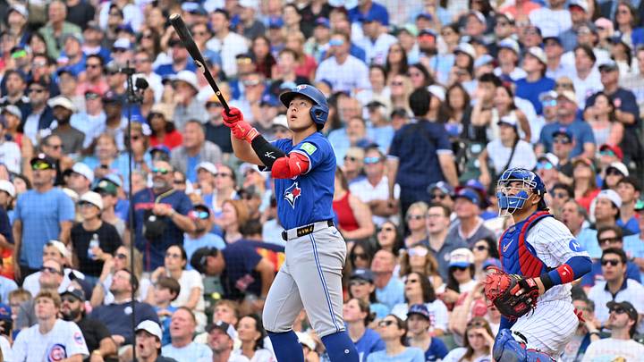 Jun 20, 2026; Chicago, Illinois, USA; Toronto Blue Jays third baseman Kazuma Okamoto (7) hits a three-run home run against the Chicago Cubs during the eighth inning at Wrigley Field. Mandatory Credit: Patrick Gorski-Imagn Images