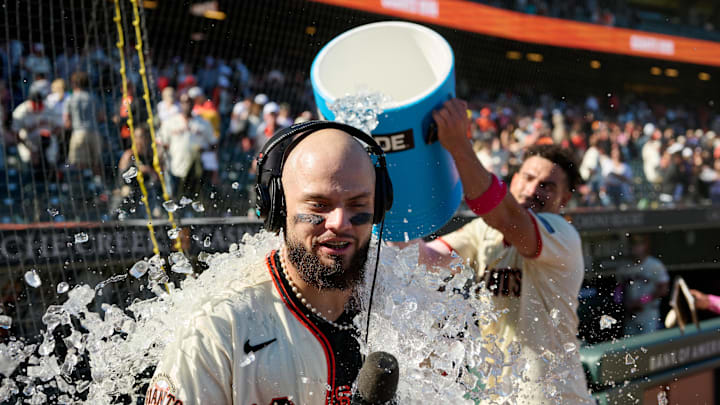 May 10, 2026; San Francisco, California, USA; San Francisco Giants Willy Adames (2) pours the contents of a beverage cooler over catcher Jesus Rodriguez (79) after Rodriguez hit the game-winning single in the twelfth inning against the Pittsburgh Pirates at Oracle Park. Mandatory Credit: Robert Edwards-Imagn Images May 10, 2026; San Francisco, California, USA; San Francisco Giants Willy Adames (2) pours the contents of a beverage cooler over catcher Jesus Rodriguez (79) after Rodriguez hit the game-winning single in the twelfth inning against the Pittsburgh Pirates at Oracle Park. Mandatory Credit: Robert Edwards-Imagn Images