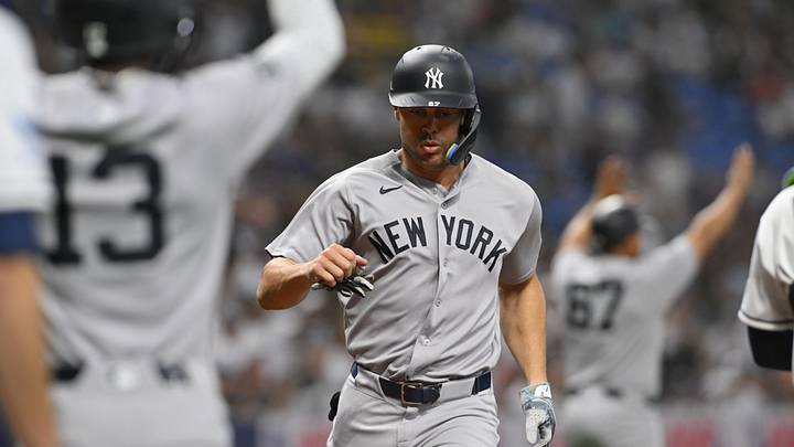 Apr 10, 2026; St. Petersburg, Florida, USA; New York Yankees outfielder Giancarlo Stanton (27) runs to home base during the first inning against Tampa Bay Rays at Tropicana Field. Mandatory Credit: Pablo Robles-Imagn Images