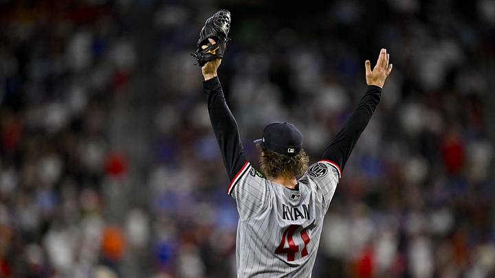 Jun 18, 2026; Arlington, Texas, USA; Minnesota Twins starting pitcher Joe Ryan (41) celebrates after right fielder Kody Clemens (not pictured) catches a fly ball during the fifth inning against the Texas Rangers at Globe Life Field. Mandatory Credit: Jerome Miron-Imagn Images