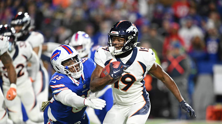 Nov 13, 2023; Orchard Park, New York, USA; Denver Broncos wide receiver Marvin Mims Jr. (19) looks for extra yards against the Buffalo Bills. 