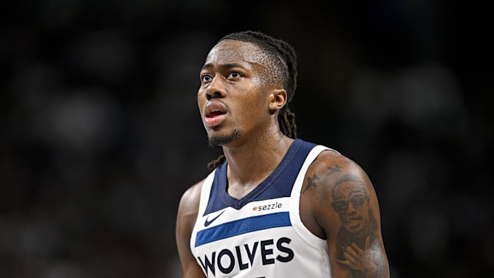Mar 30, 2026; Dallas, Texas, USA; Minnesota Timberwolves guard Ayo Dosunmu (13) looks on during the second half against the Dallas Mavericks at the American Airlines Center. Mandatory Credit: Jerome Miron-Imagn Images
