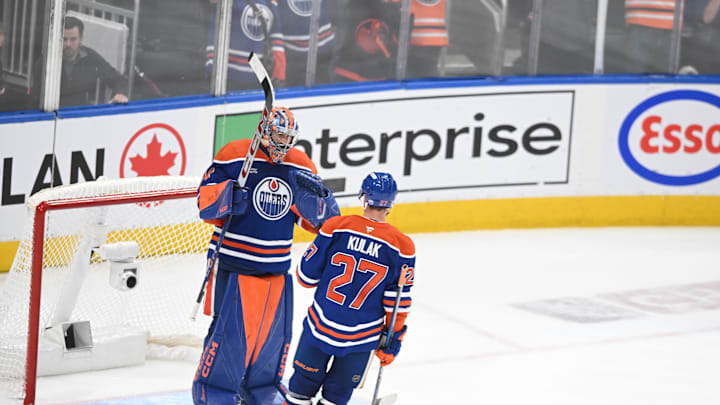 May 12, 2025; Edmonton, Alberta, CAN; Edmonton Oilers goalie Stuart Skinner (74) celebrates their win with defenseman Brett Kulak (27) over the Las Vegas Golden Knights during the third period in game three of the second round of the 2025 Stanley Cup Playoffs at Rogers Place. Mandatory Credit: Walter Tychnowicz-Imagn Images May 12, 2025; Edmonton, Alberta, CAN; Edmonton Oilers goalie Stuart Skinner (74) celebrates their win with defenseman Brett Kulak (27) over the Las Vegas Golden Knights during the third period in game three of the second round of the 2025 Stanley Cup Playoffs at Rogers Place. Mandatory Credit: Walter Tychnowicz-Imagn Images