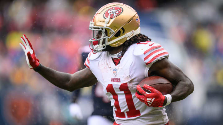 Sep 11, 2022; Chicago, Illinois, USA; San Francisco 49ers wide receiver Brandon Aiyuk (11) runs after a catch in the first quarter against the Chicago Bears at Soldier Field. Mandatory Credit: Daniel Bartel-USA TODAY Sports Sep 11, 2022; Chicago, Illinois, USA; San Francisco 49ers wide receiver Brandon Aiyuk (11) runs after a catch in the first quarter against the Chicago Bears at Soldier Field. Mandatory Credit: Daniel Bartel-USA TODAY Sports