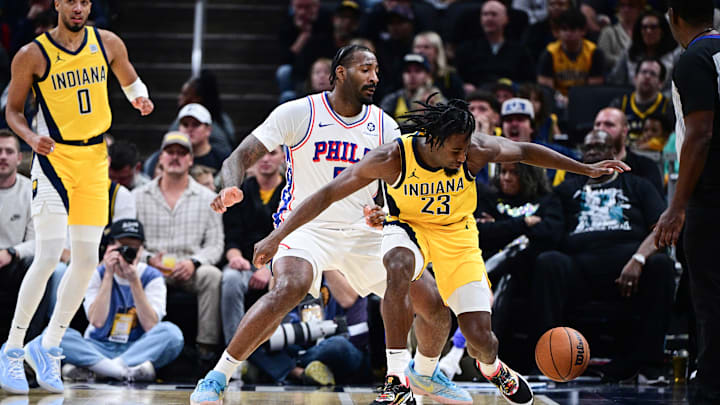 Oct 27, 2024; Indianapolis, Indiana, USA; Philadelphia 76ers center Andre Drummond (5) knocks a ball away from Indiana Pacers forward Aaron Nesmith (23) during the second half at Gainbridge Fieldhouse. Mandatory Credit: Marc Lebryk-Imagn Images Oct 27, 2024; Indianapolis, Indiana, USA; Philadelphia 76ers center Andre Drummond (5) knocks a ball away from Indiana Pacers forward Aaron Nesmith (23) during the second half at Gainbridge Fieldhouse. Mandatory Credit: Marc Lebryk-Imagn Images