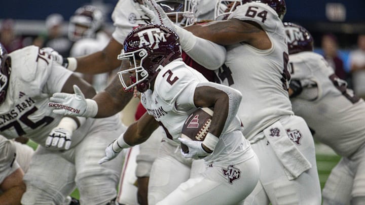 Sep 30, 2023; Arlington, Texas, USA; Texas A&M Aggies running back Rueben Owens (2) In action during the game between the Texas A&M Aggies and the Arkansas Razorbacks at AT&T Stadium. Mandatory Credit: Jerome Miron-Imagn Images Sep 30, 2023; Arlington, Texas, USA; Texas A&M Aggies running back Rueben Owens (2) In action during the game between the Texas A&M Aggies and the Arkansas Razorbacks at AT&T Stadium. Mandatory Credit: Jerome Miron-Imagn Images