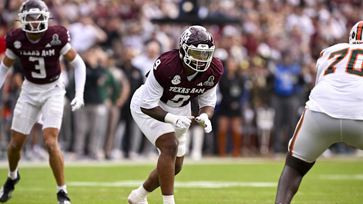 Dec 20, 2025; College Station, TX, USA; Texas A&M Aggies defensive end Cashius Howell (9) lines up during the game between the Aggies and the Hurricanes at Kyle Field. Mandatory Credit: Jerome Miron-Imagn Images Dec 20, 2025; College Station, TX, USA; Texas A&M Aggies defensive end Cashius Howell (9) lines up during the game between the Aggies and the Hurricanes at Kyle Field. Mandatory Credit: Jerome Miron-Imagn Images