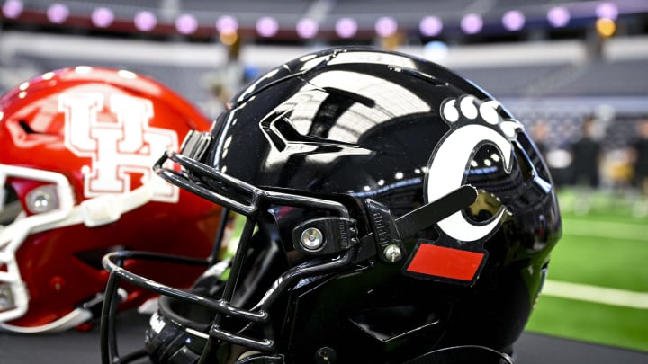 Jul 12, 2023; Arlington, TX, USA; A view of the Cincinnati Bearcats helmet and logo during Big 12 football media day at AT&T Stadium. Mandatory Credit: Jerome Miron-USA TODAY Sports