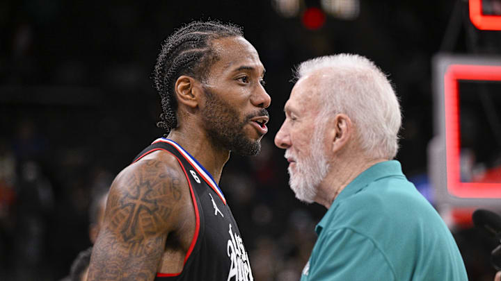 Jan 20, 2023; San Antonio, Texas, USA; LA Clippers forward Kawhi Leonard (left) talks with San Antonio Spurs head coach Gregg Popovich (right) after the game at the AT&T Center. Mandatory Credit: Jerome Miron-USA TODAY Sports Jan 20, 2023; San Antonio, Texas, USA; LA Clippers forward Kawhi Leonard (left) talks with San Antonio Spurs head coach Gregg Popovich (right) after the game at the AT&T Center. Mandatory Credit: Jerome Miron-USA TODAY Sports