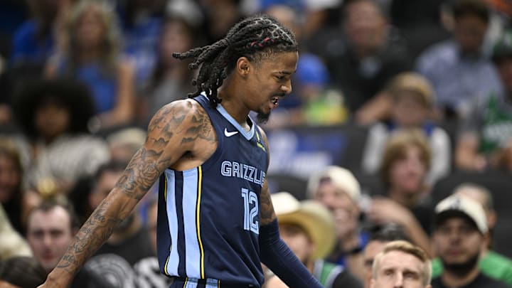 Memphis Grizzlies guard Ja Morant (12) walks off the court against the Dallas Mavericks at the American Airlines Center. 