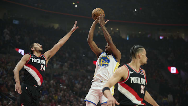 Apr 11, 2025; Portland, Oregon, USA; Golden State Warriors forward Jonathan Kuminga (00) shoots a jump shot during the first half against Portland Trail Blazers forward Kris Murray (24) at Moda Center. Mandatory Credit: Troy Wayrynen-Imagn Images Apr 11, 2025; Portland, Oregon, USA; Golden State Warriors forward Jonathan Kuminga (00) shoots a jump shot during the first half against Portland Trail Blazers forward Kris Murray (24) at Moda Center. Mandatory Credit: Troy Wayrynen-Imagn Images