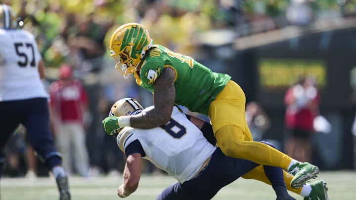 Aug 30, 2025; Eugene, Oregon, USA; Oregon Ducks linebacker Matayo Uiagalelei (10) sacks Montana State Bobcats quarterback Justin Lamson (8) during the second half at Autzen Stadium. Mandatory Credit: Troy Wayrynen-Imagn Images