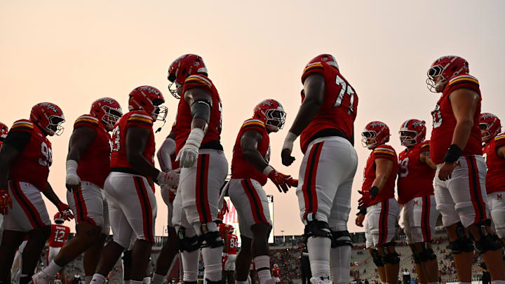 Sep 5, 2025; College Park, Maryland, USA; The Maryland Terrapins greet each other as they warm up before a game against the Northern Illinois Huskies at SECU Stadium. Mandatory Credit: Jamie Sabau-Imagn Images Sep 5, 2025; College Park, Maryland, USA; The Maryland Terrapins greet each other as they warm up before a game against the Northern Illinois Huskies at SECU Stadium. Mandatory Credit: Jamie Sabau-Imagn Images