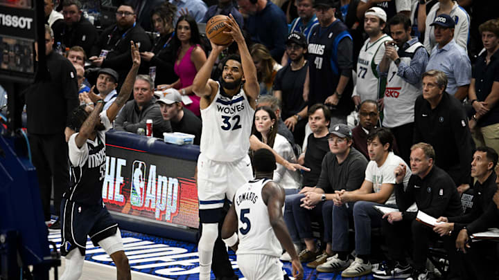 Minnesota Timberwolves center Karl-Anthony Towns (32) makes a 3-point shot against the Dallas Mavericks during the second half in Game 4 of the Western Conference finals at American Airlines Center in Dallas on May 28, 2024.