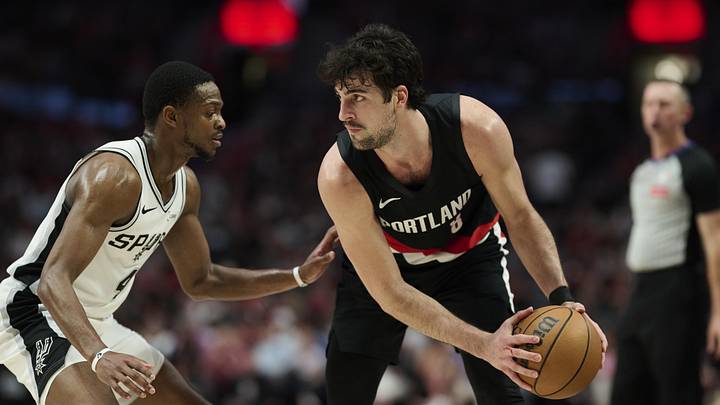 Portland Trail Blazers forward Deni Avdija looks to pass the ball during the first half against San Antonio Spurs guard De'Aaron Fox during game four of the first round of the 2026 NBA Playoffs at Moda Center. Mandatory Credit: Troy Wayrynen-Imagn Images Portland Trail Blazers forward Deni Avdija looks to pass the ball during the first half against San Antonio Spurs guard De'Aaron Fox during game four of the first round of the 2026 NBA Playoffs at Moda Center. Mandatory Credit: Troy Wayrynen-Imagn Images