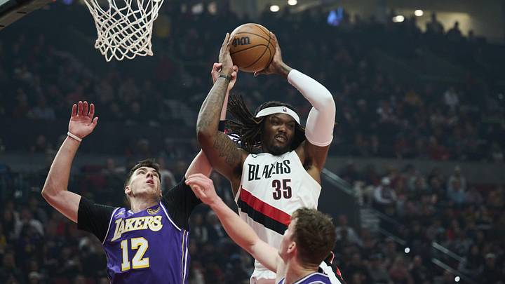 Portland Trail Blazers center Robert Williams III grabs a rebound during the first half against Los Angeles Lakers forward Jake LaRavia at Moda Center. Mandatory Credit: Troy Wayrynen-Imagn Images Portland Trail Blazers center Robert Williams III grabs a rebound during the first half against Los Angeles Lakers forward Jake LaRavia at Moda Center. Mandatory Credit: Troy Wayrynen-Imagn Images