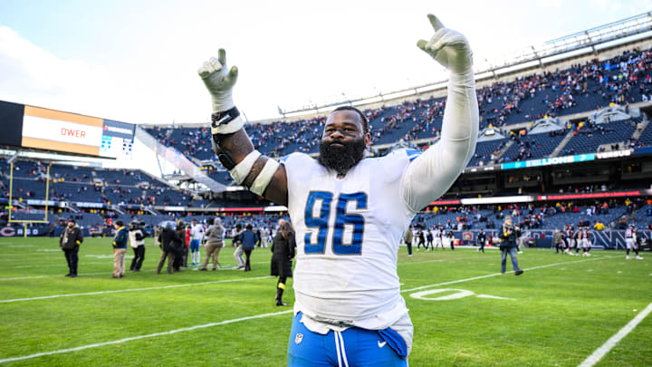 Nov 13, 2022; Chicago, Illinois, USA; Detroit Lions defensive tackle Isaiah Buggs (96) celebrates after the game against the Chicago Bears at Soldier Field. Mandatory Credit: Daniel Bartel-USA TODAY Sports Nov 13, 2022; Chicago, Illinois, USA; Detroit Lions defensive tackle Isaiah Buggs (96) celebrates after the game against the Chicago Bears at Soldier Field. Mandatory Credit: Daniel Bartel-USA TODAY Sports